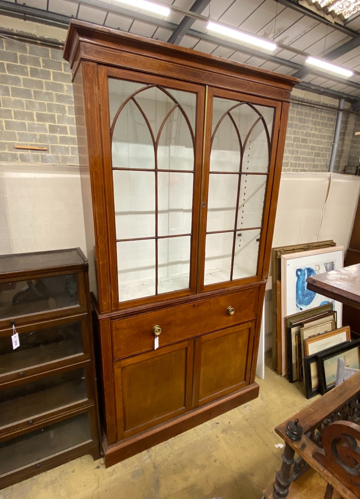 A George III mahogany secretaire bookcase, length 122cm, depth 33cm, height 232cm